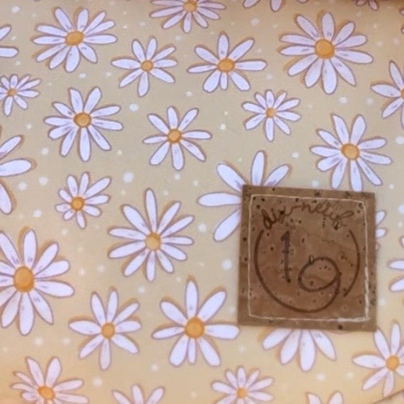 Le Charlevoix - Sac en demi-lune en canevas jaune à motif de fleurs marguerites
